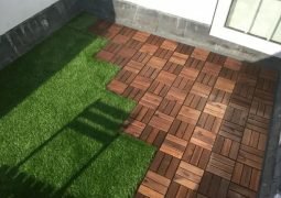 Deck-tiles-on-grass.webp.jpeg